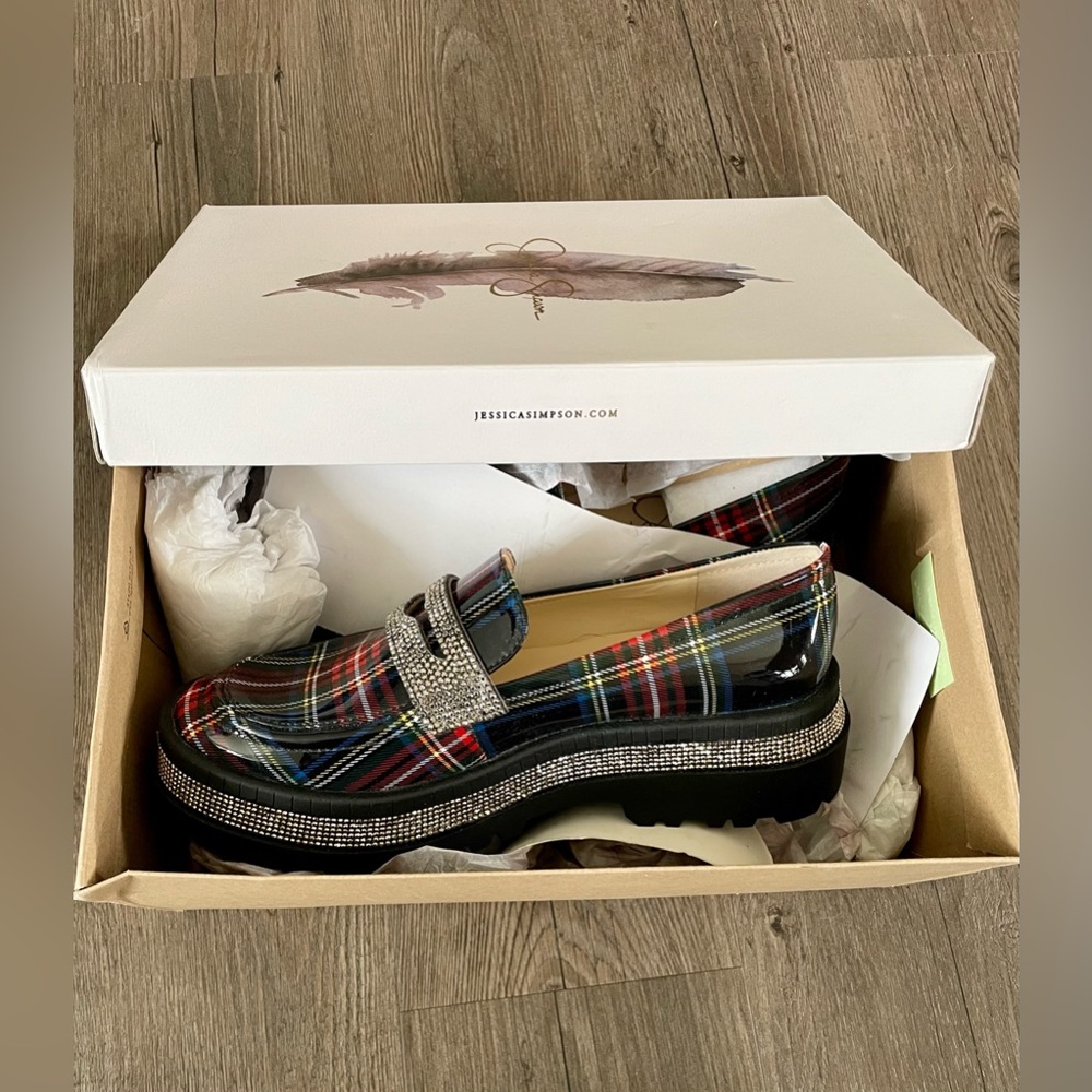 Never worn, still in box, Jessica Simpson plaid and rhinestone loafers.